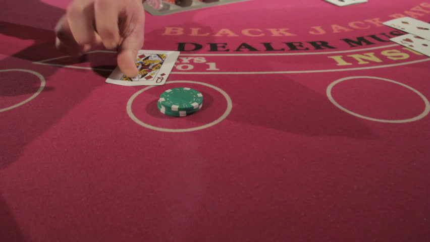 Cards being played at a blackjack table