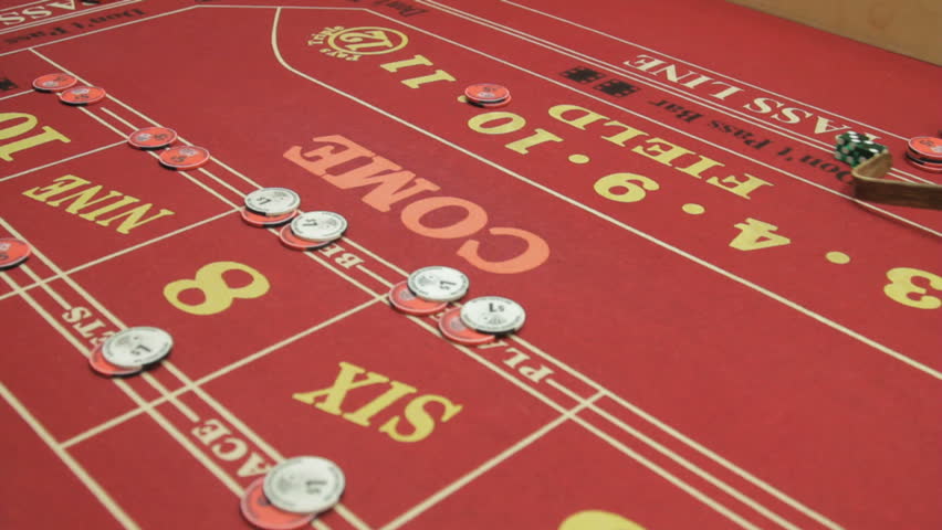Panning view of a crap table in Las Vegas