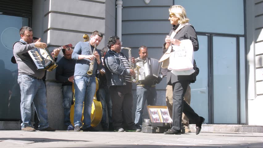 MADRID - MAR 9: (Timelapse View) Music band play on street of Madrid, on Mar 9, 2012 in Madrid, Spain