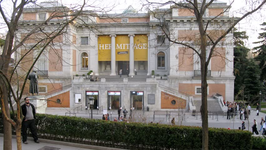 MADRID - MAR 10: (Timelapse View) Bus stands at stop near Prado museum, on Mar 10, 2012 in Madrid, Spain