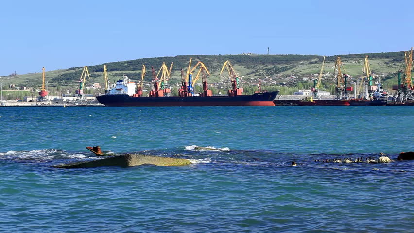The cargo ship standing on raid in seaport