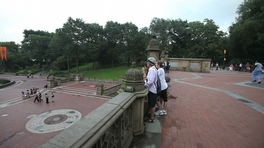 New York - Circa 2009: Central Park in 2009. Pan from right to left of pedestrian bridge to Bethesda Fountain below in New York CIty, New York.
