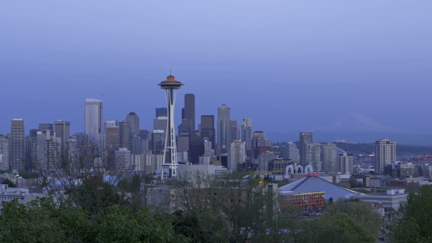 Timelapse of the Seattle Skyline sunset on May 11th 2012 in Seattle, USA. Space Needle in new orange painting for 50 year anniversary of the world exhibition in 2012.