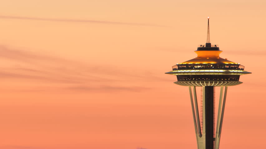 SEATTLE, USA - MAY 12, 2012: Timelapse of Seattle Space Needle during sunset. Space Needle in new orange painting for 50 year anniversary of the world exhibition in 2012.