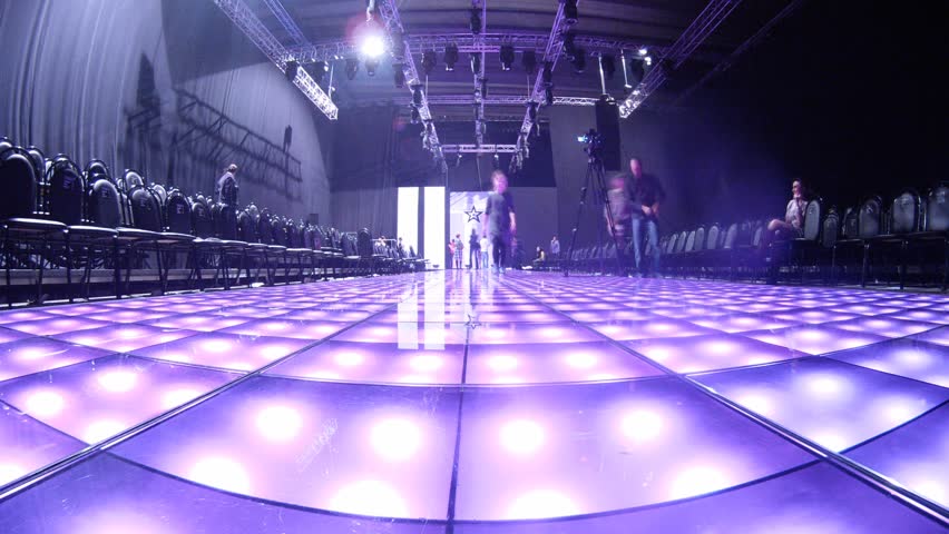 MOSCOW - APR 8: (Timelapse View) People go on podium after mannequin parade on VOLVO - Week of fashion in Moscow in Gostini dvor, on April 8, 2012 in Moscow, Russia