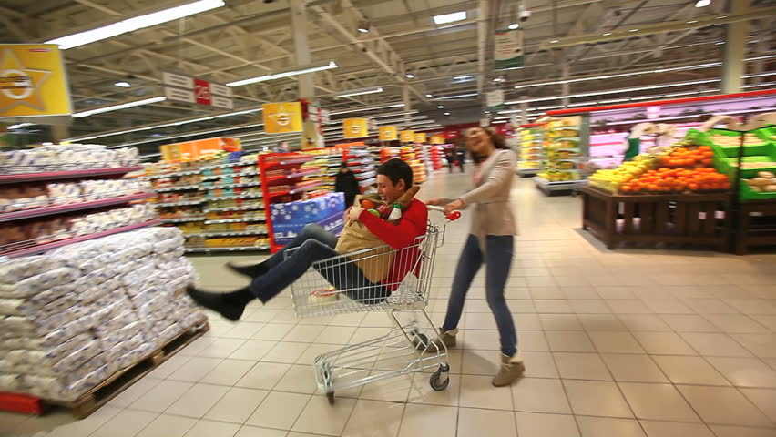 Funny shoppers knocking themselves out in a shopping mall
