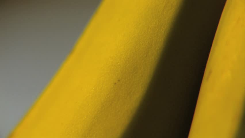 Drops of Rain Landing on Banana - Close Up
