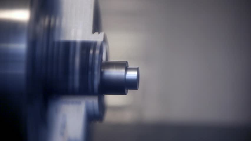 Industrial lathe works metal with precision