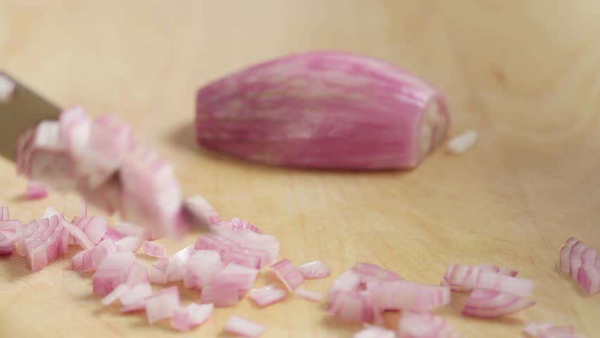 Chopping shallot finely