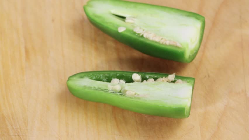 Deseeding a jalapeno chilli