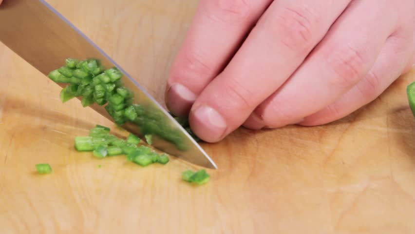 Finely chopping jalapeno chilli