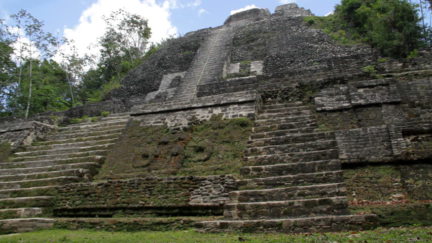 Pan of Mayan temple at Lamanai ("submerged crocodile") in Belize.