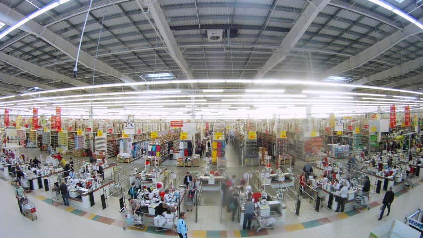 SAMARA - MAY 5: (Timelapse View) People make purchases in Auchan superstore, on May 5, 2012 in Samara, Russia. French distribution network Auchan unites more than 1300 shops.