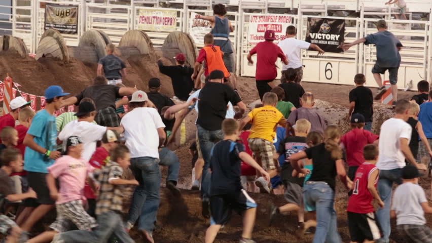 NEPHI, JUAB,UTAH 30 JUN 2012: Crowd people obstacle course slow. Annual rural community motorcycle obstacle challenge race. Juab County extreme enduro. Economic impact to farming area.