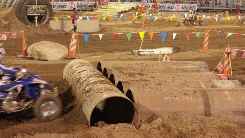 NEPHI, JUAB,UTAH 30 JUN 2012: Annual rural community ATV four wheel obstacle challenge race. Juab County extreme enduro. Economic impact to farming area.  Difficult obstacle course with jumps.