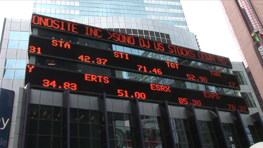 New York, NY - CIRCA March 2006: A wide shot of an electronic billboard that scrolls the days current stock prices
