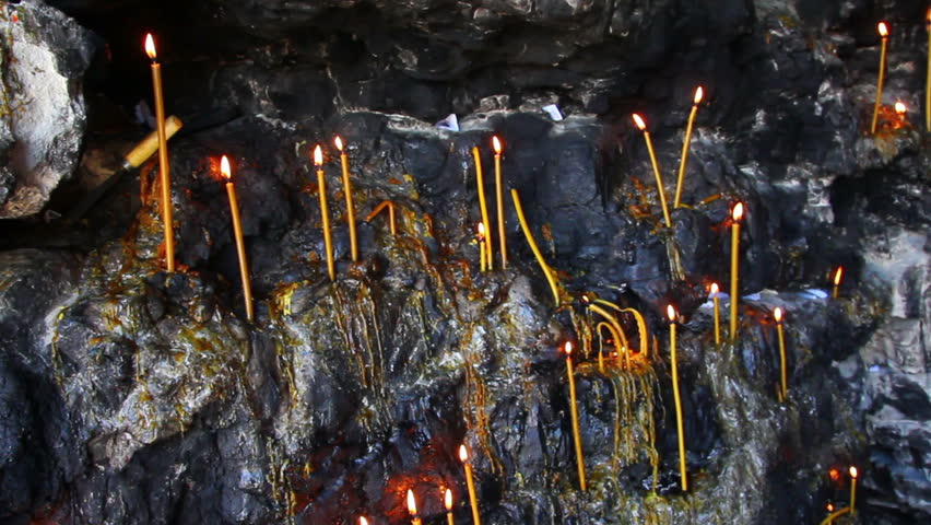 Christian holy place - candles in grotto