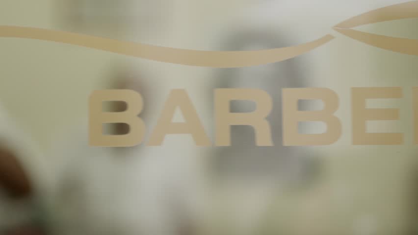 Male beauty, elderly barber cutting hair to customer in hair salon or men's beauty parlor
