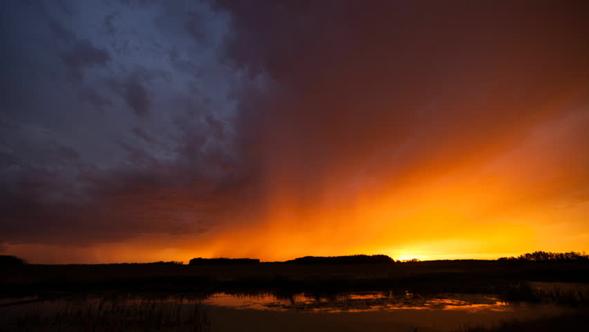 Storm Tracking Through the Sky During Sunset