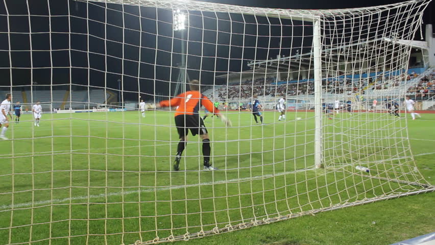 RIJEKA, CROATIA - JULY 14: soccer match between HNK Rijeka and NK Sampion Celje (friendly match) 2012 in Rijeka, Croatia. Josip Brezovec (Rijeka) scores the goal.