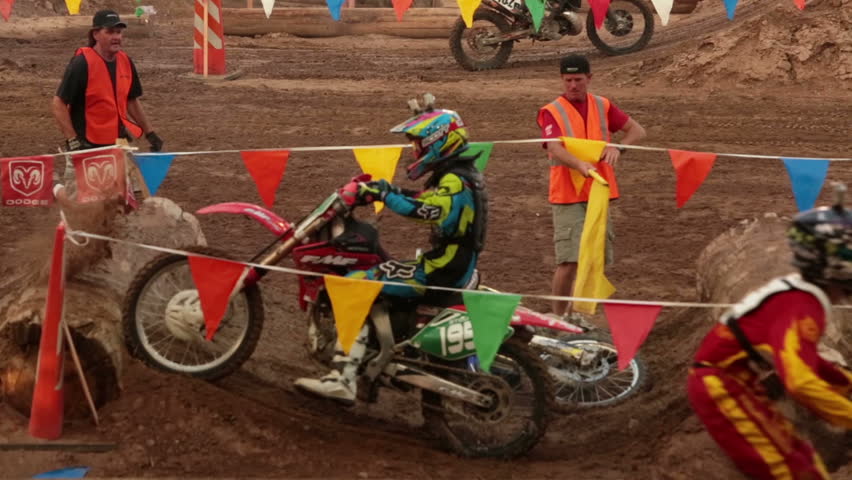 NEPHI, JUAB, UTAH JUN 2012: Economic boost to rural community in annual race. Motorcycle enduro race rider crashed. Juab County extreme enduro. Difficult obstacle course with jumps, logs and rocks