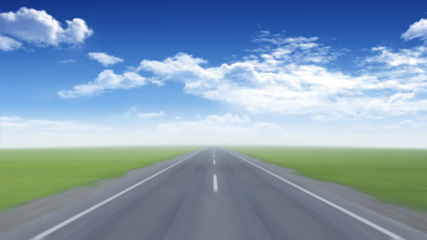 Camera moves on an empty highway during daylight 