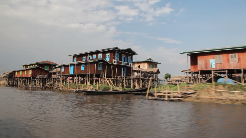 INLE LAKE, MYANMAR - APRIL 22: Trip on the boat through Inle lake on April 22, 2012 on Inle lake, Myanmar. Inle lake is one of the most popular place to visit in Myanmar.