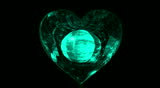 Lovely aquamarine heart rotating.