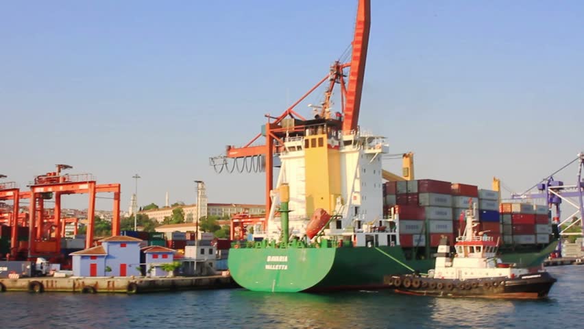 ISTANBUL - JULY 9: Container ship BAVARIA (IMO: 9113446, Malta) with full of cargo sails from the port on July 9, 2011 in Istanbul. Haydarpasa terminal is main trading port in Asian side of the city. 