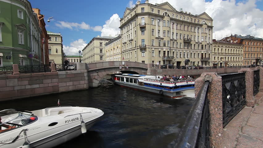 ST. PETERSBURG, RUSSIA - JULY 22: Tour ships turn to the Winter canal
