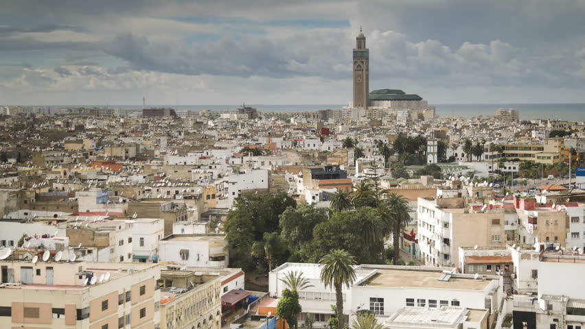 a shot of Hassan II Mosque, the third largest mosque in the world, and of Casablanca