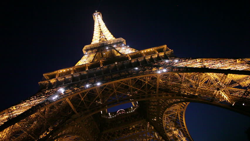 PARIS, FRANCE - CIRCA MAY 2011: View upwards from underneath the Eiffel Tower at night