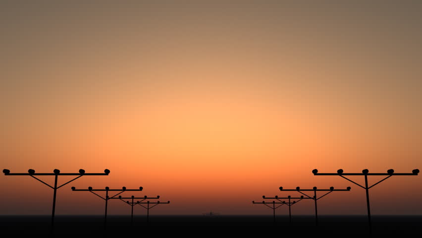 Silhouette of an airplane taking off during sunset.