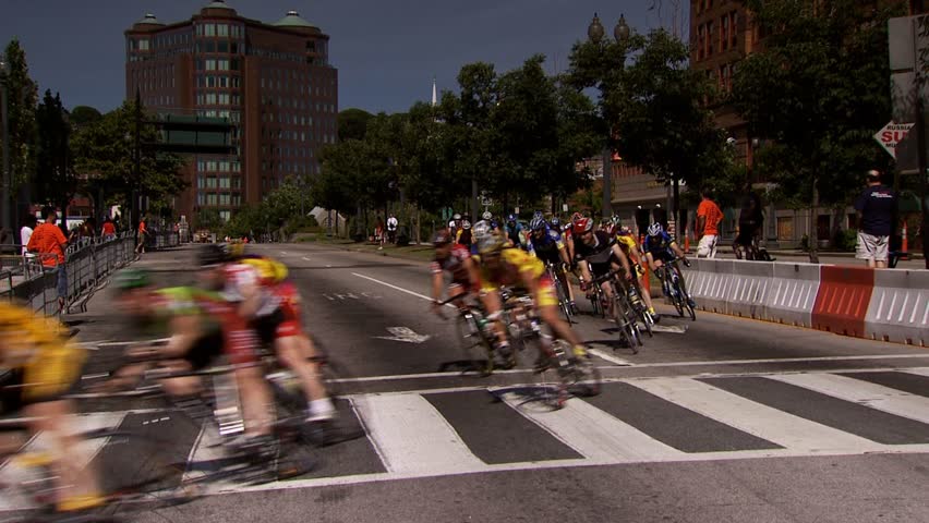 PROVIDENCE, RHODE ISLAND - SEPTEMBER 3, 2009: Pack of bicycle racers rounding street corner in race
