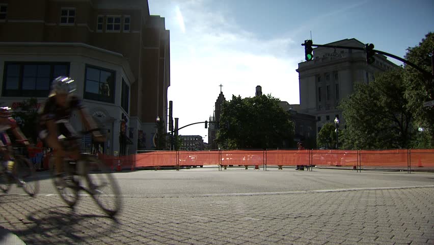 PROVIDENCE, RHODE ISLAND - SEPTEMBER 3, 2009: Pack of women bicycle racers rounding street corner in race