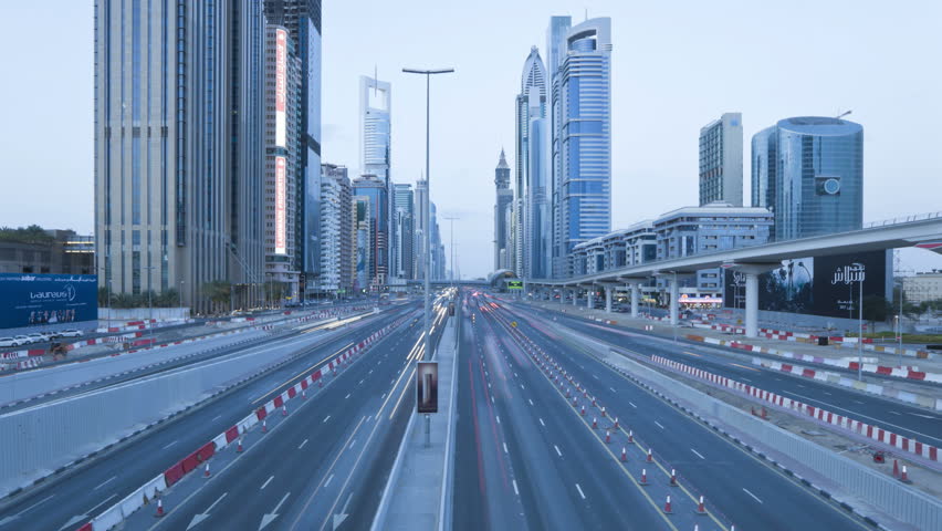 DUBAI, UNITED ARAB EMIRATES - CIRCA MAY 2011: Sheikh Zayed Rd, traffic and new high rise buildings along Dubai's main road