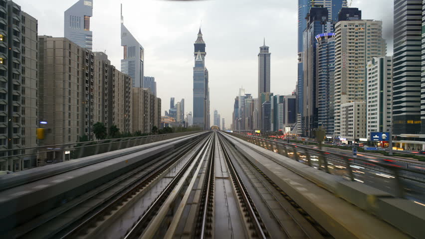 DUBAI, UNITED ARAB EMIRATES - CIRCA MAY 2011: journey on the modern Rail Metro System, running alongside the Sheikh Zayed Rd.