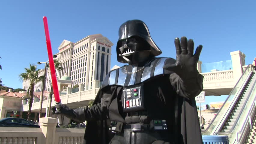 July 2012 Las Vegas, Nevada - Star Wars character Darth Vader battles and performs for camera.