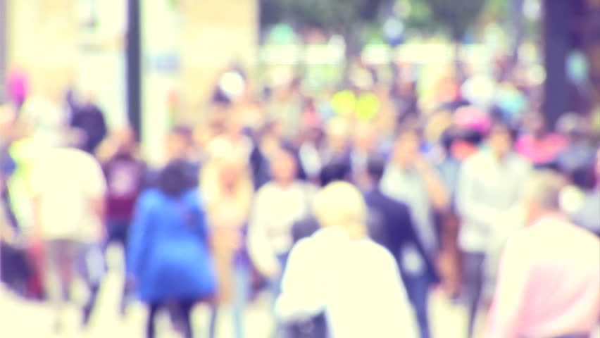 Abstract crowd walking in city