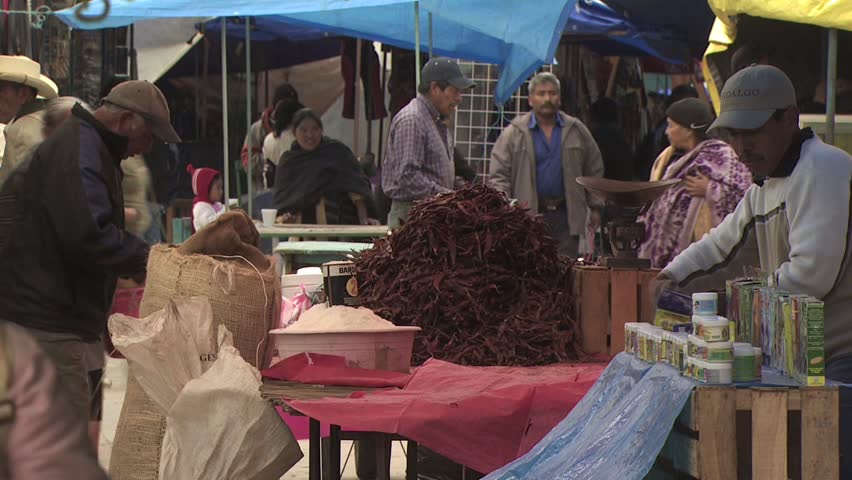 MEXICO CITY - CIRCA 2010: Mexican Vendors Set Up Merchandise 