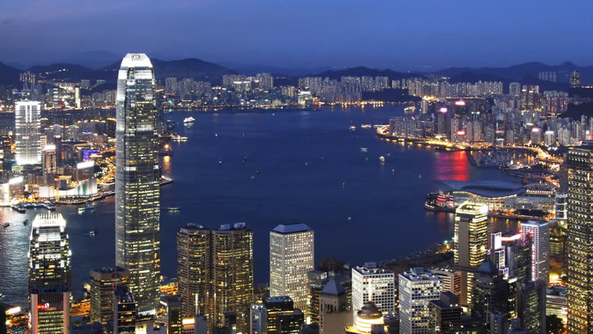 Blue Night in Hong Kong ( zoom out ) - Central District, Victoria Harbor, Hong Kong Island and Kowloon, Hong Kong.