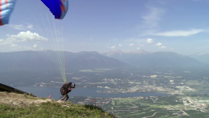 Paragliding high above the Columbia Valley at Invermere, British Columbia, Canada