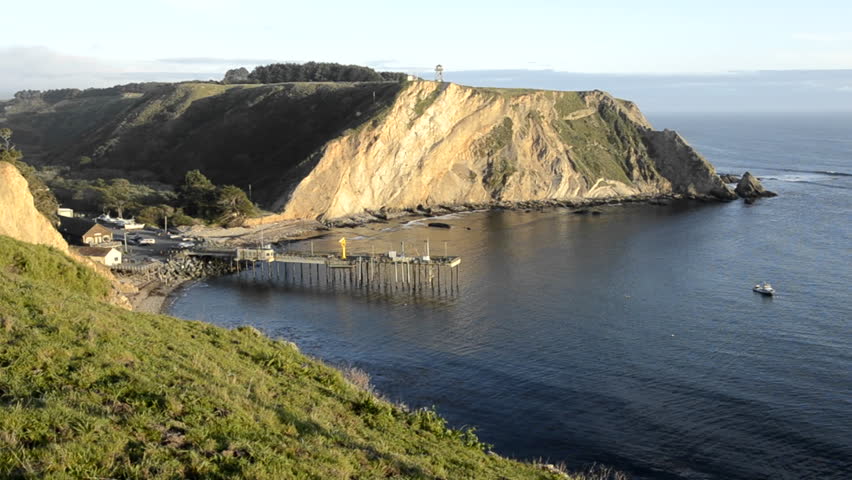 POINT ARENA, CALIFORNIA-CIRCA 2011-Close up of Arena Cove and a calm ocean at sunset from the Cypress Abbey County property at Point Arena, California.