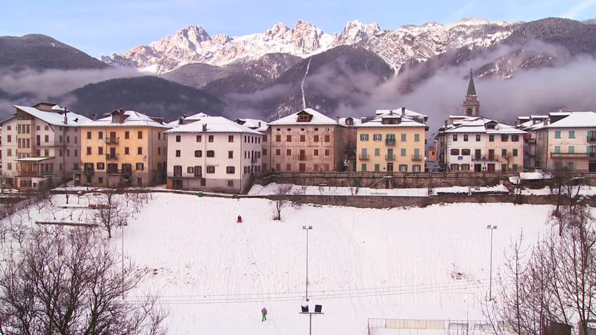 SWISS ALPS, SWITZERLAND-CIRCA 2011-A snowbound village in the Alps in Austria, Switzerland, Italy, Slovenia or an Eastern European country.