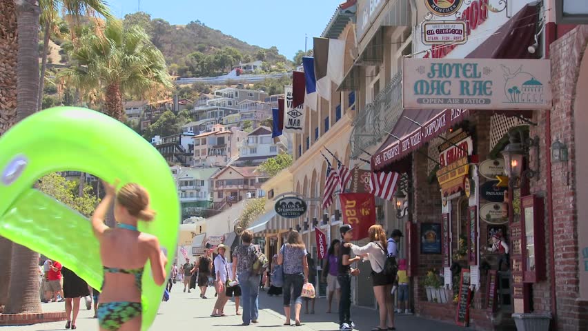 CATALINA ISLAND, CA-CIRCA 2011-Summer crowds on the boardwalk at Catalina Island in Southern California.