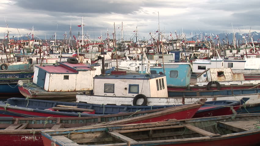 Many ships at a seaport in Puerto Natales, Chile