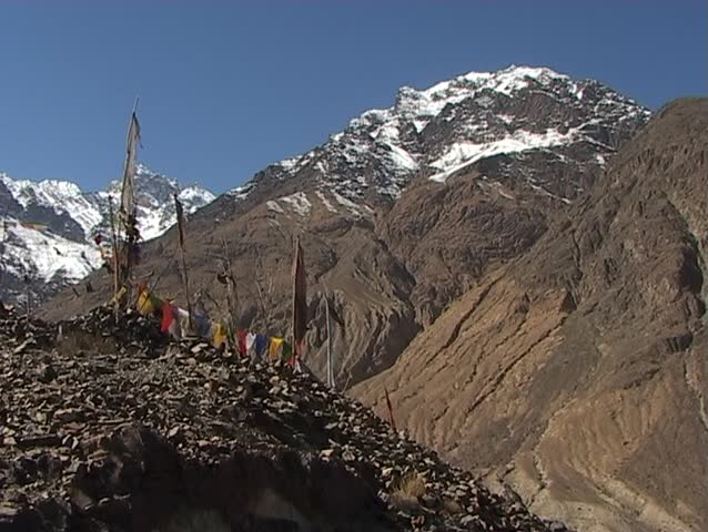 Buddhist prayer flags in the mountains. Tibetan Prayer Flags