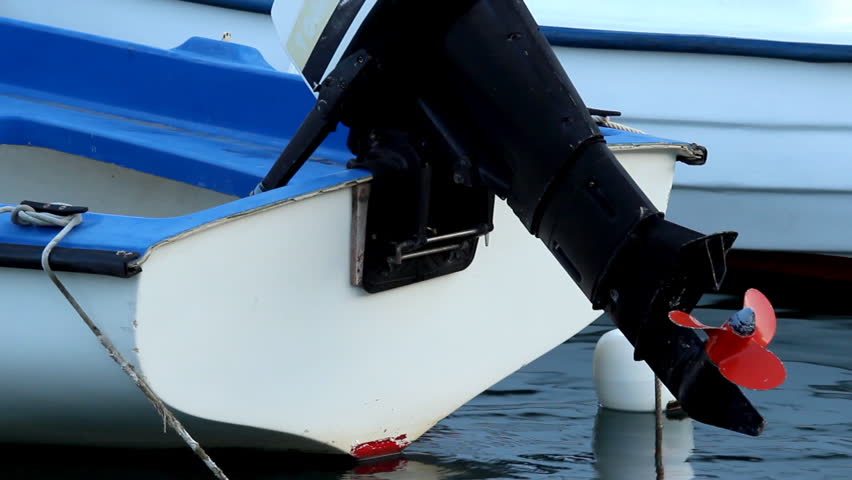 Fishing boats engines and bouy

Description: Fishing boats engines and bouy at the port

