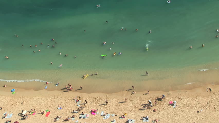 High angle view of tourists on the beach in Waikiki, Honolulu, Hawaii, time lapse