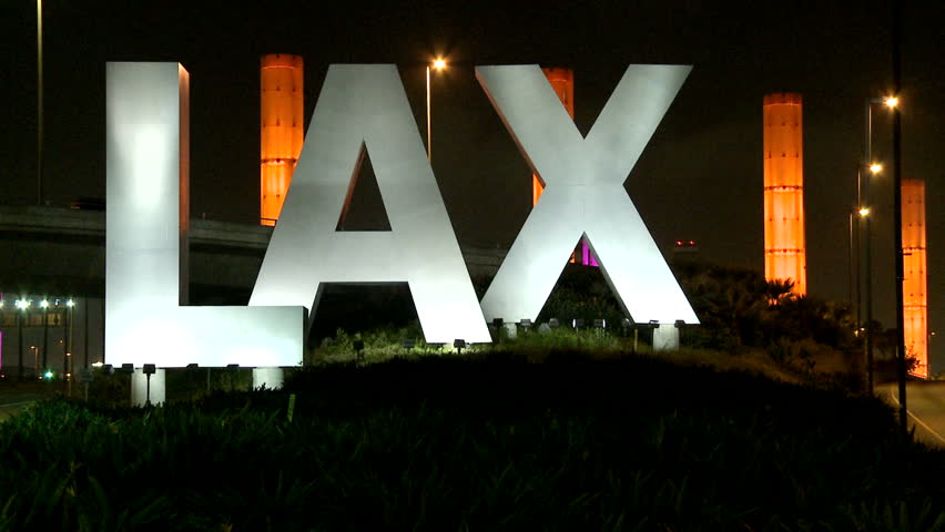 LOS ANGELES - CIRCA 2012: Time Lapse of the LAX International Airport Sign

